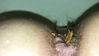 Hairy pussy girl poop closeup