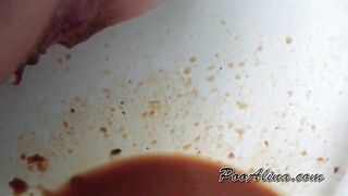 Girl in bikini splashing on the sink