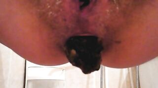 Wet hairy pussy lady dropping meaty turd