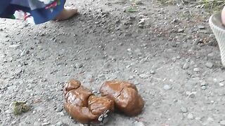 Stunning mommy and outdoor poop