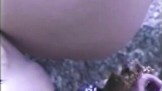 Brunette Mistress shit and piss on a slave in outdoor