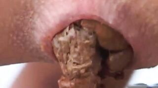 Digging for shit from her asshole