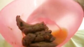 Lady pooping in the bowl
