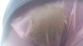 Poop filling her plastic panties