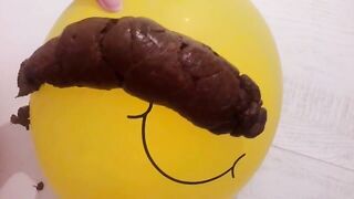 Shitting on a big yellow balloon