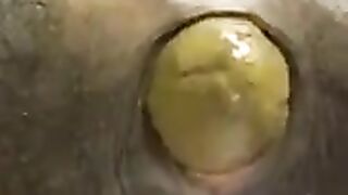Yellow turd in sweet close up