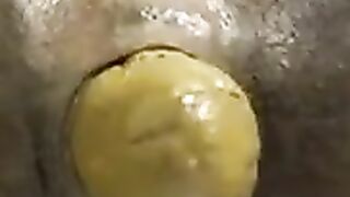 Yellow turd in sweet close up