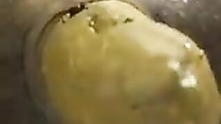 Yellow turd in sweet close up