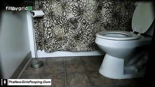 Amateur hot brunette girl pooping in toilet