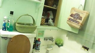 Nerdy mature lady in glasses pooping