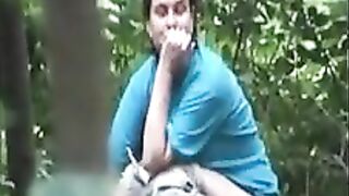 husband helping wife pooping in the park