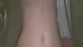 Teen stretching her vagina and pissing