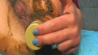 Bitch inserts shampoo in her ass