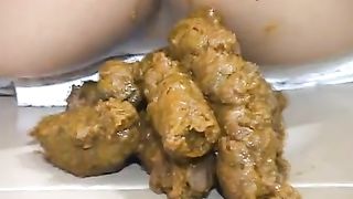 sweet asian girl pooping