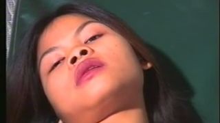 Thai girl touches herself then shits and pisses all over