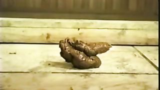 Young girl shits atop of wooden table