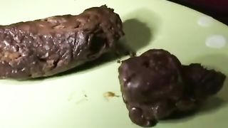 Ebony shitting in a plate to prepare a tasty dish
