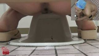 Swimmer poops in the floor toilet