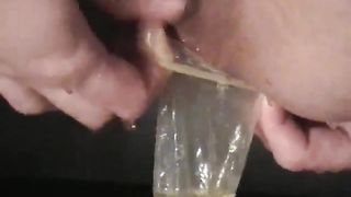 Girl masturbates with shit filled condome