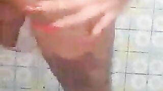 Hot tranny babe pooping in the shower