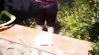 Sexy looking babe poops outdoor