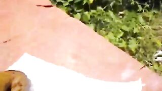 Sexy looking babe poops outdoor