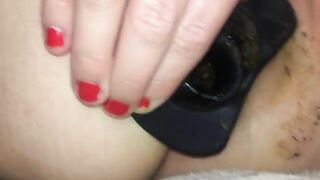 Struggling with the butt plug dildo