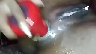 Black beauty banging her asshole with dildo