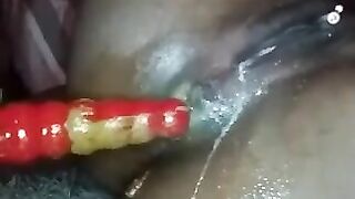 Black beauty banging her asshole with dildo