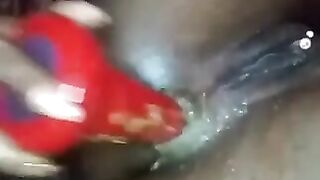 Black beauty banging her asshole with dildo