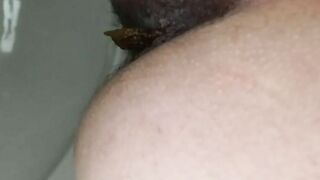 Dark hot pooping asshole