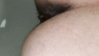 Dark hot pooping asshole