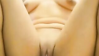 Shaved girl masturbates in closeup