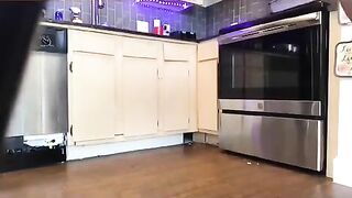 Dark sexy babe poops in the kitchen