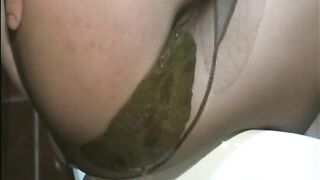 Blonde milf shitting in pantyhose