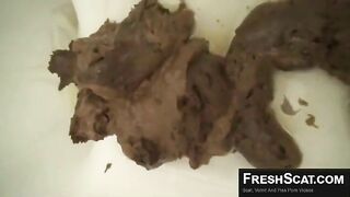 Massive dark poop from Japanese milf