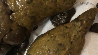 Showing her asshole and turds