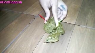 Teasing her poop with lollipop