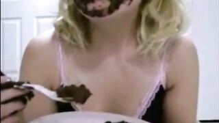 Masked blonde eating her own mess