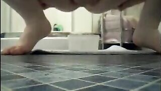 Lusty bbw shitting in a plastic box