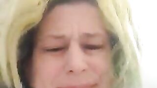 Mature blonde lady poop closeup