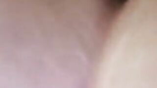 Woman pisses while squatting in the bathroom