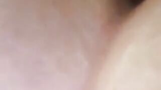 Woman pisses while squatting in the bathroom