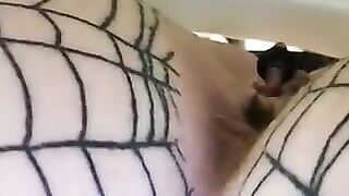 Babe lets piss flow on net stockings