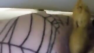 Woman pisses on tiled floor while wearing stockings