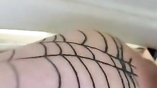 Woman in a fishnet stocking lets a cock fuck her ass in a bathtub