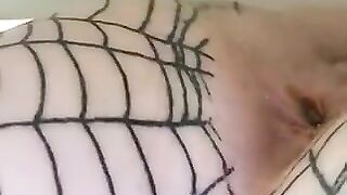 Babe squats with rope tied around ass