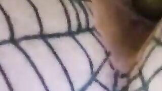 Girl with nipple ring and barbed wire bondage