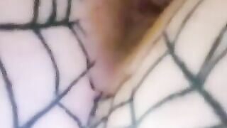 Girl with nipple ring and barbed wire bondage