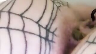 Woman pees on her fishnet stockings
